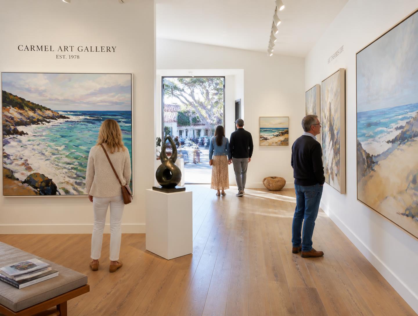 A Carmel art gallery hung with coastal paintings